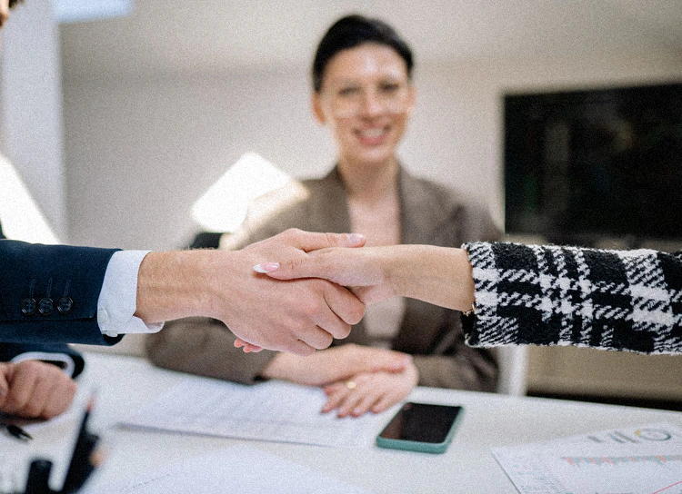 A handshake at the end of a meeting