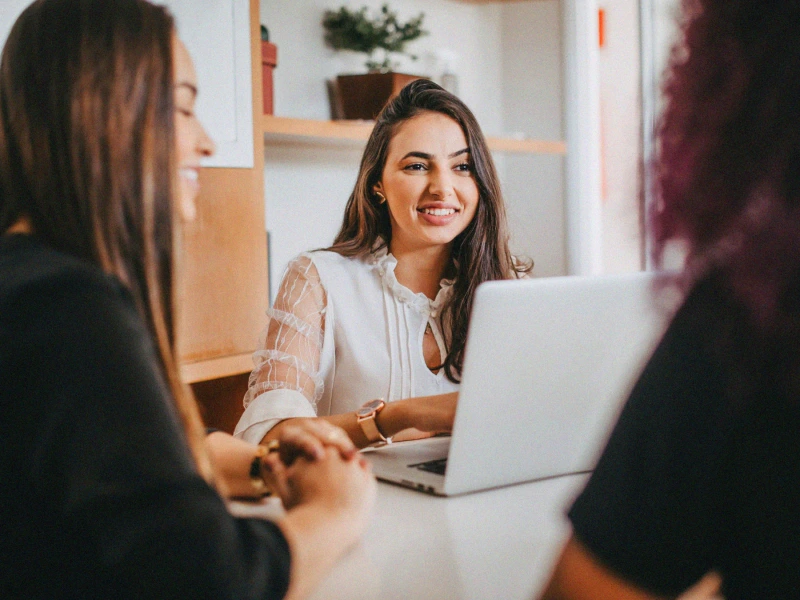 A candidate in interview with two recruiters